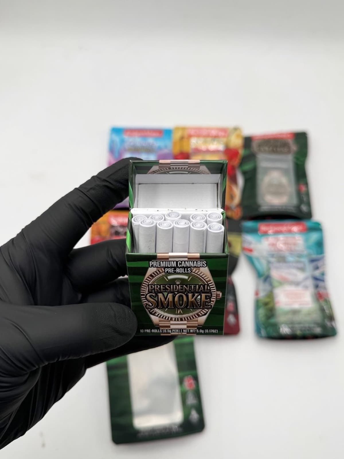 Presidential Smoke box open showing rolled pre-rolls