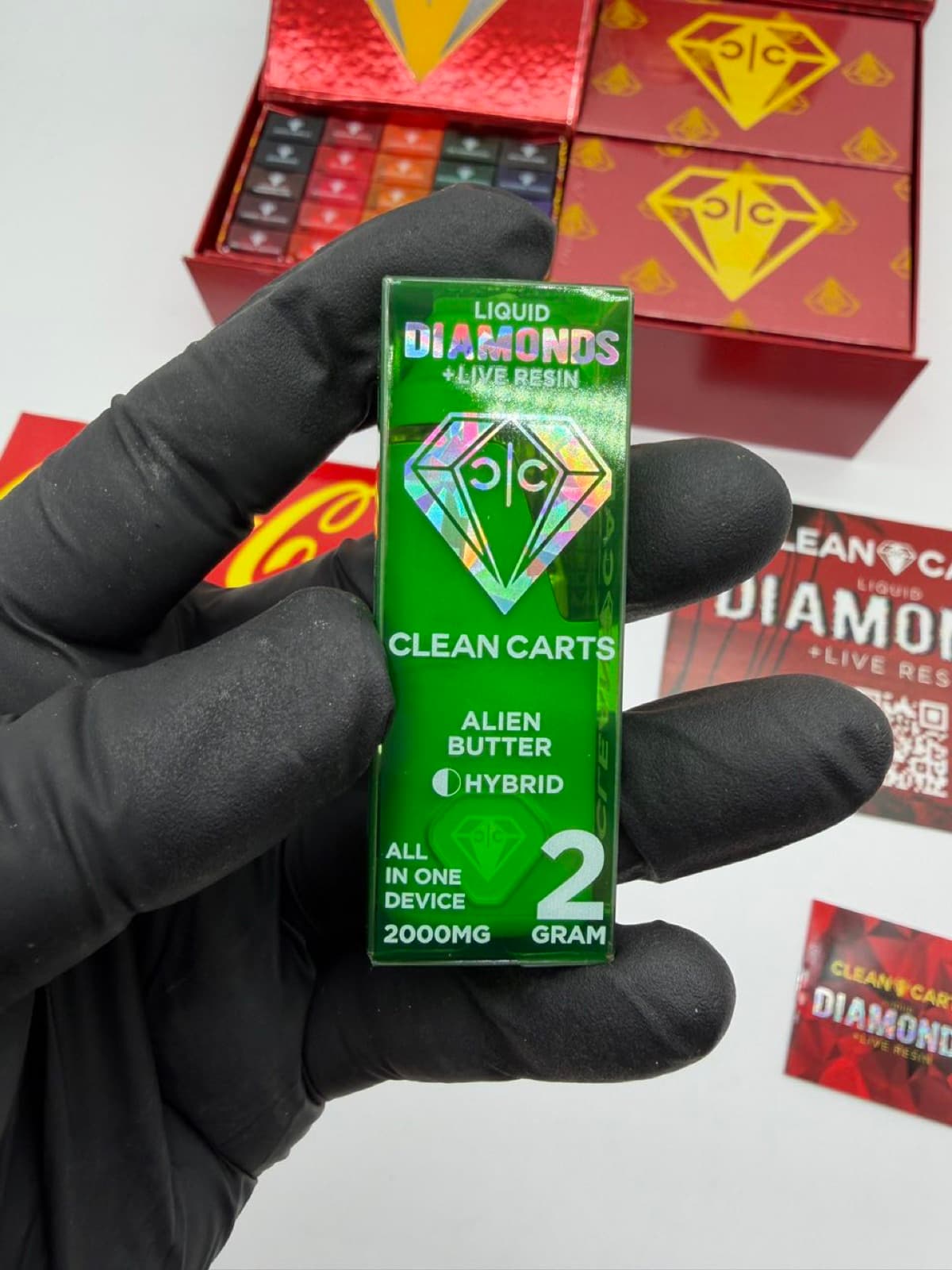 Clean Carts Alien Butter green box held in hand