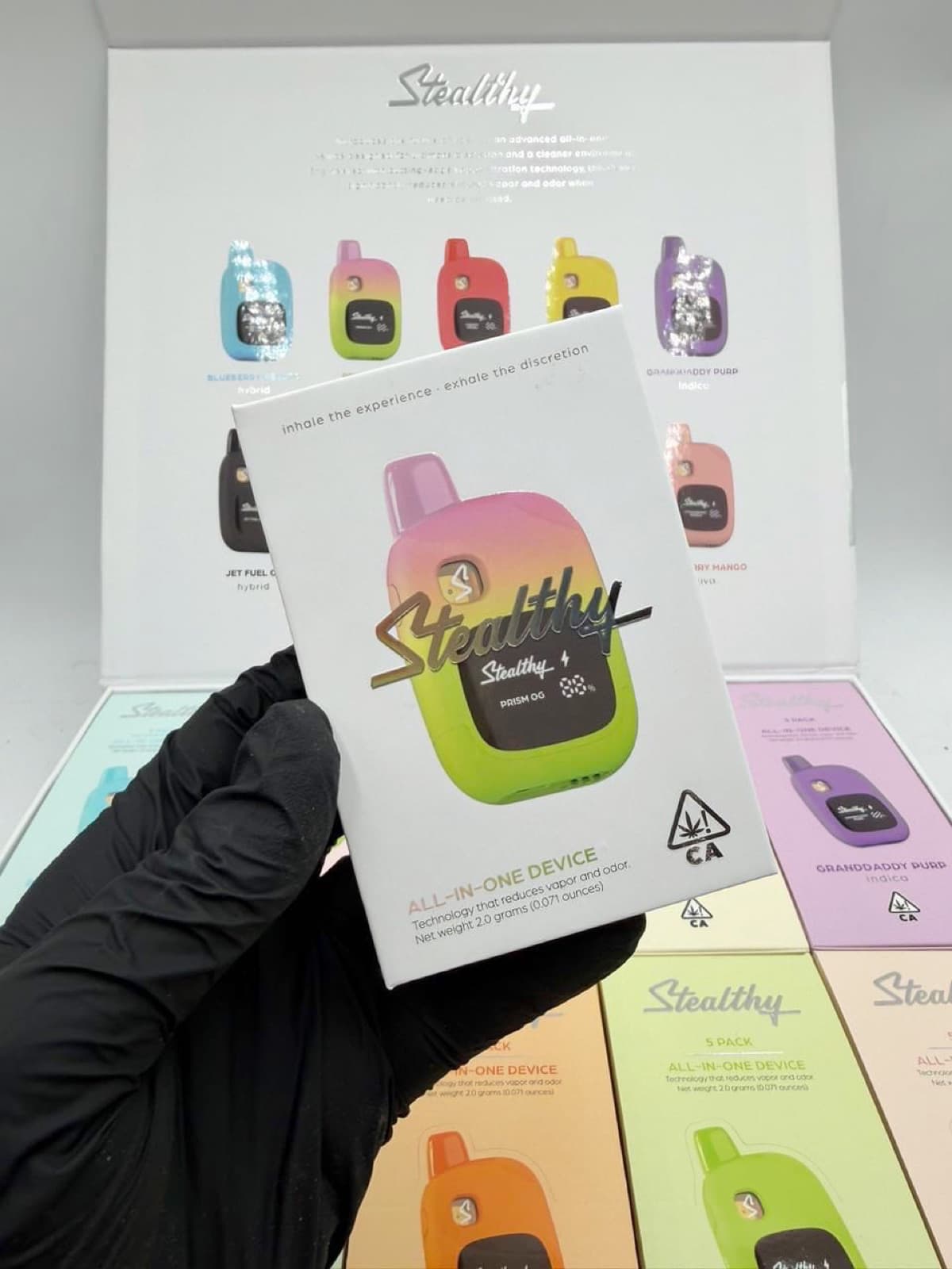 Stealthy Prism OG box held in hand