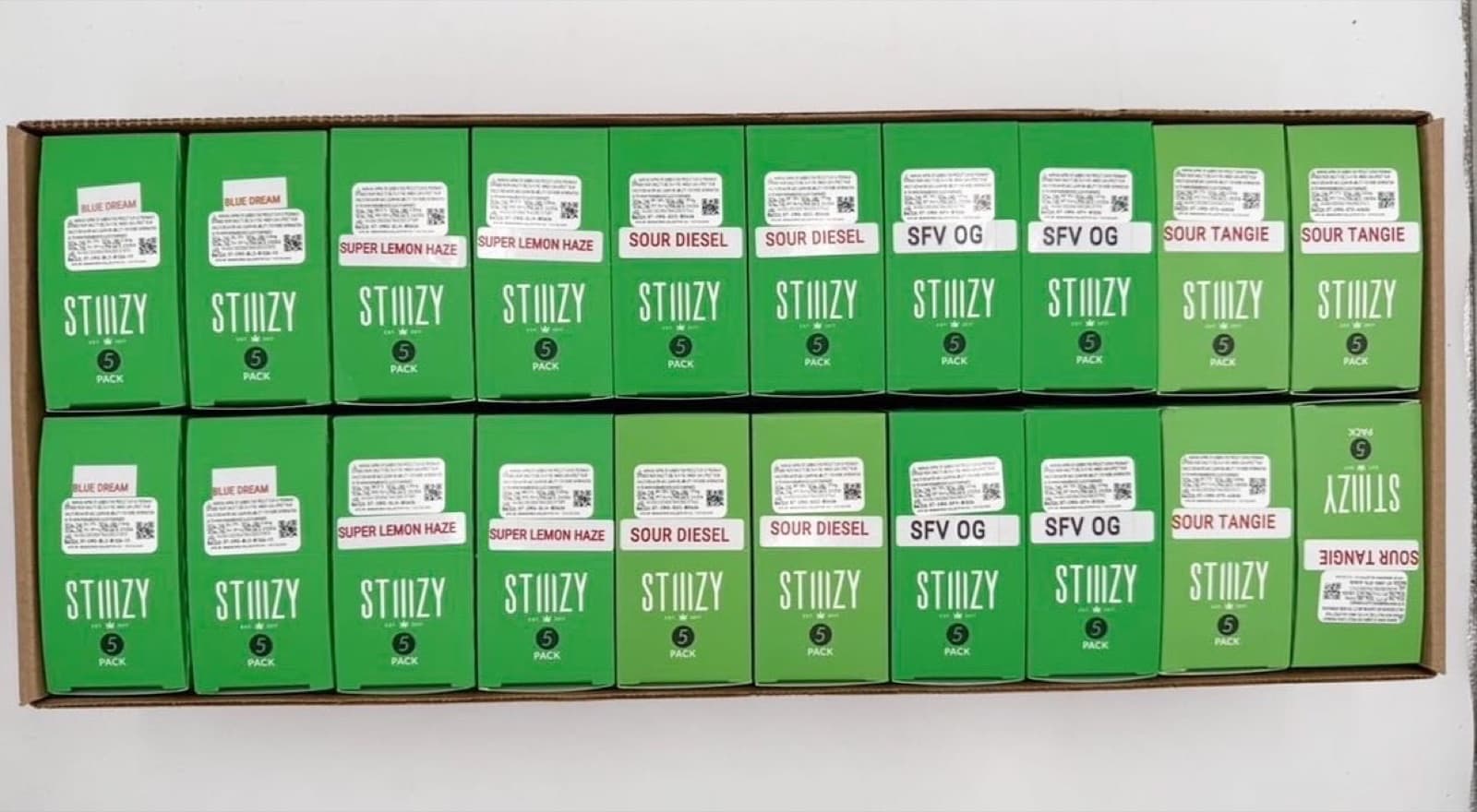Tray of Stiiizy 5-pack boxes across strains