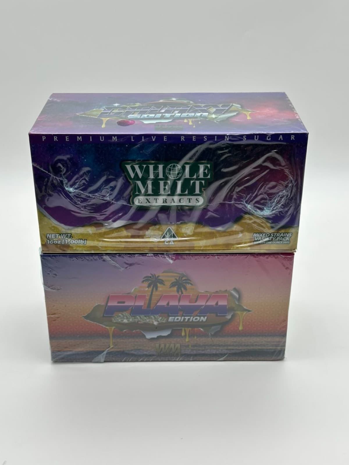 Whole Melt Galaxy and Playa edition boxes stacked